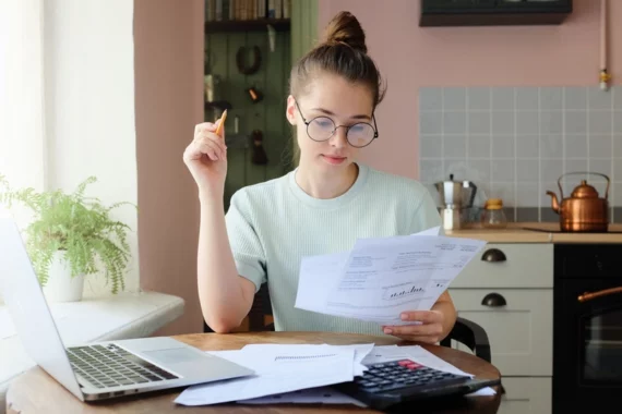 student looking over the numbers of buying student rental in Ontario for investment